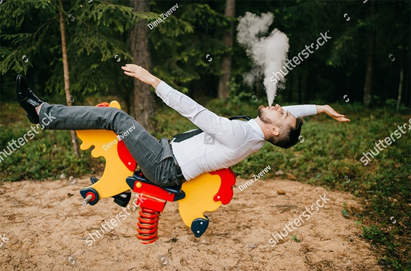 WTF stock photos vaping in a kids park