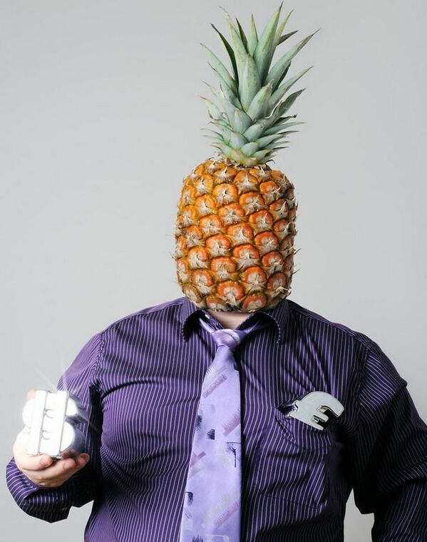 WTF stock photos pineapple headed man in business suit