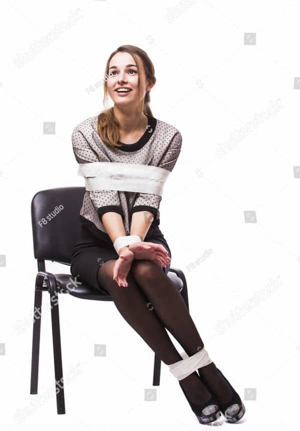 WTF stock photos woman tied up in a chair but she's happy