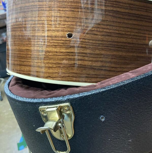 guitar with a drill hole in it, funny people having a worse day, well that sucks