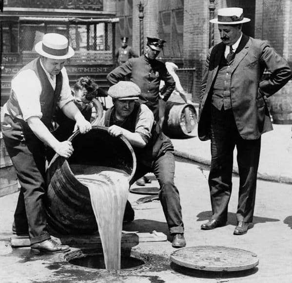 black and white photo of men dumping something in a sewer, Funny Fake history photos, r fakehistoryporn, facts about history that are not true, false textbook photos, historical pics with funny captions, lol, jokes, old photos with hilarious explanations, funny pics