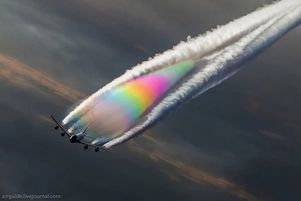 Plane jet fuel making a rainbow, Funny Fake history photos, r fakehistoryporn, facts about history that are not true, false textbook photos, historical pics with funny captions, lol, jokes, old photos with hilarious explanations, funny pics
