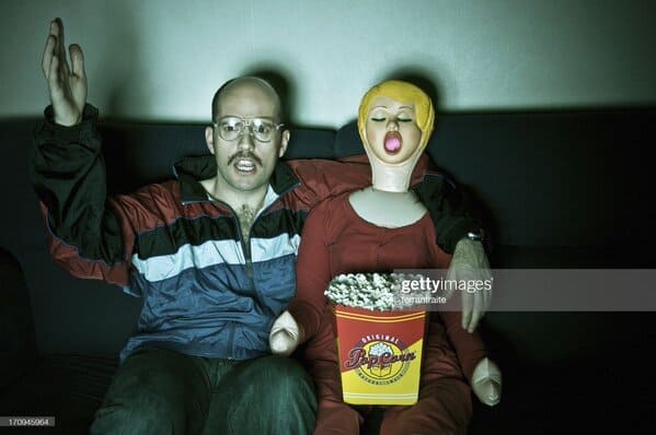 bald man with blowup doll in front of TV, Sexy stock photos twitter, funny wtf stock photos, innocent searches that led to weirdly sexualized stock photos, hot sexy men and women of shutterstock, Getty, hornystockphoto, twitter