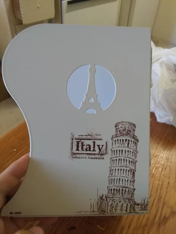 eiffel tower logo on Italy book, Funny Graphic Design Fails, Bad deign, reddit crappy design, lol, poor planning, weird visual errors someone should fix, dumb designs, photos